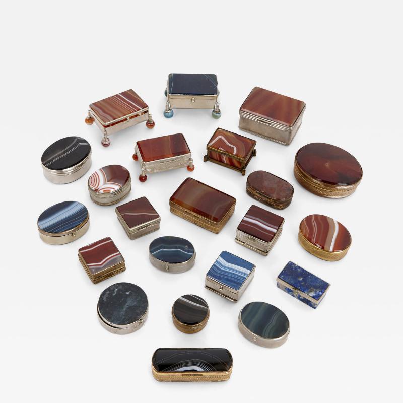 Twenty two miniature boxes mounted with silvered and gilt metal