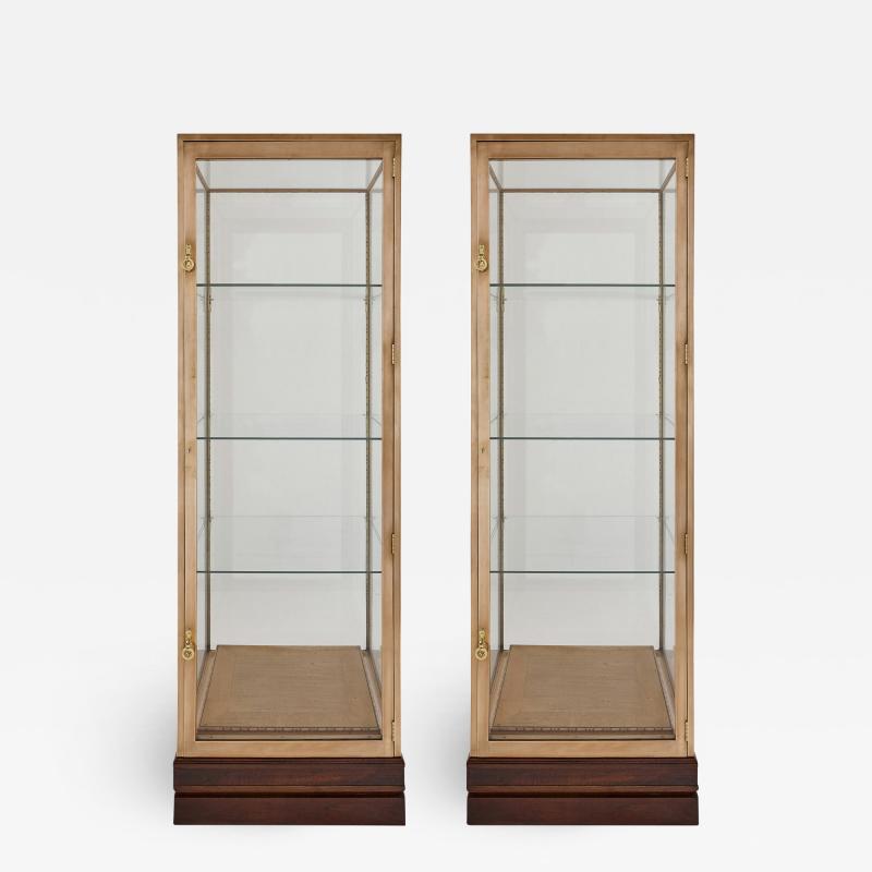 Two French burnished brass Art Deco vitrines