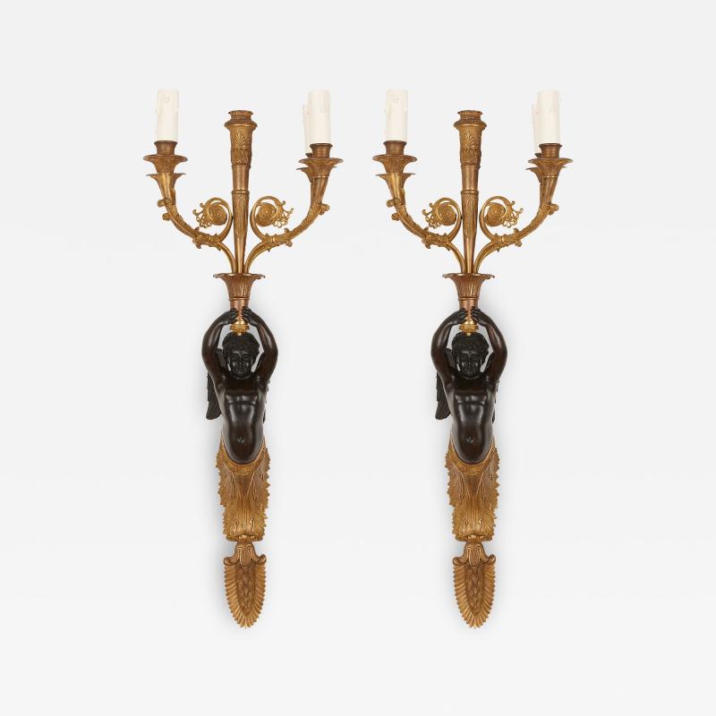 Two French gilt and patinated bronze sconces