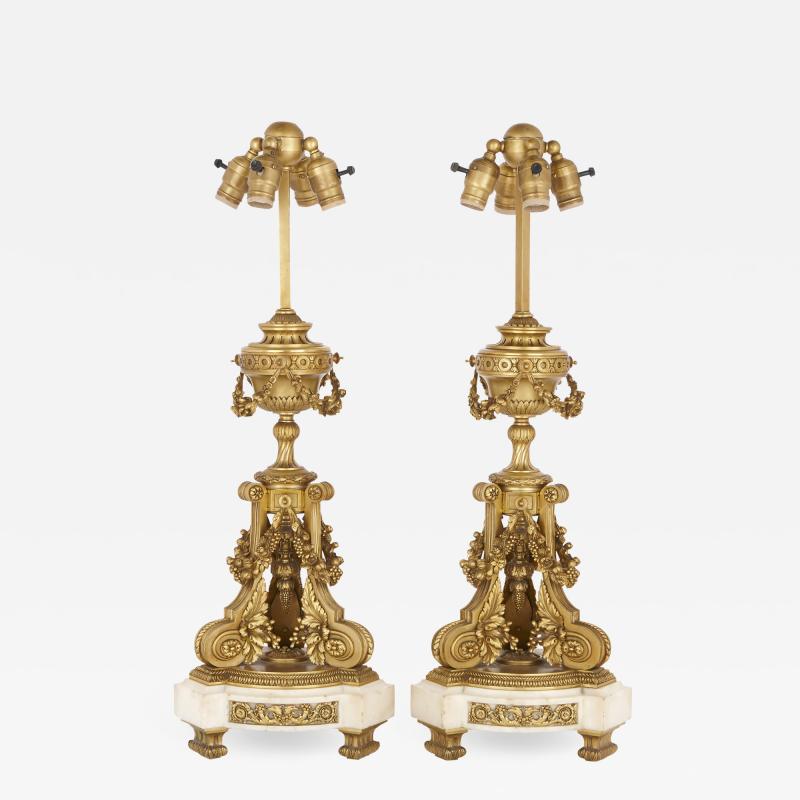 Two antique Louis XV style gilt bronze and marble table lamps