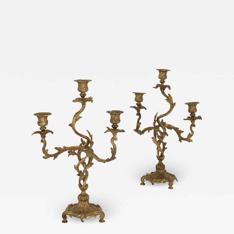 Two antique Rococo style gilt bronze candelabra