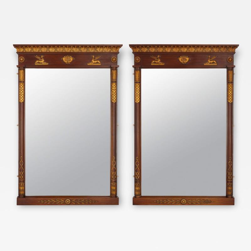 Two large English neoclassical carved wood mirrors
