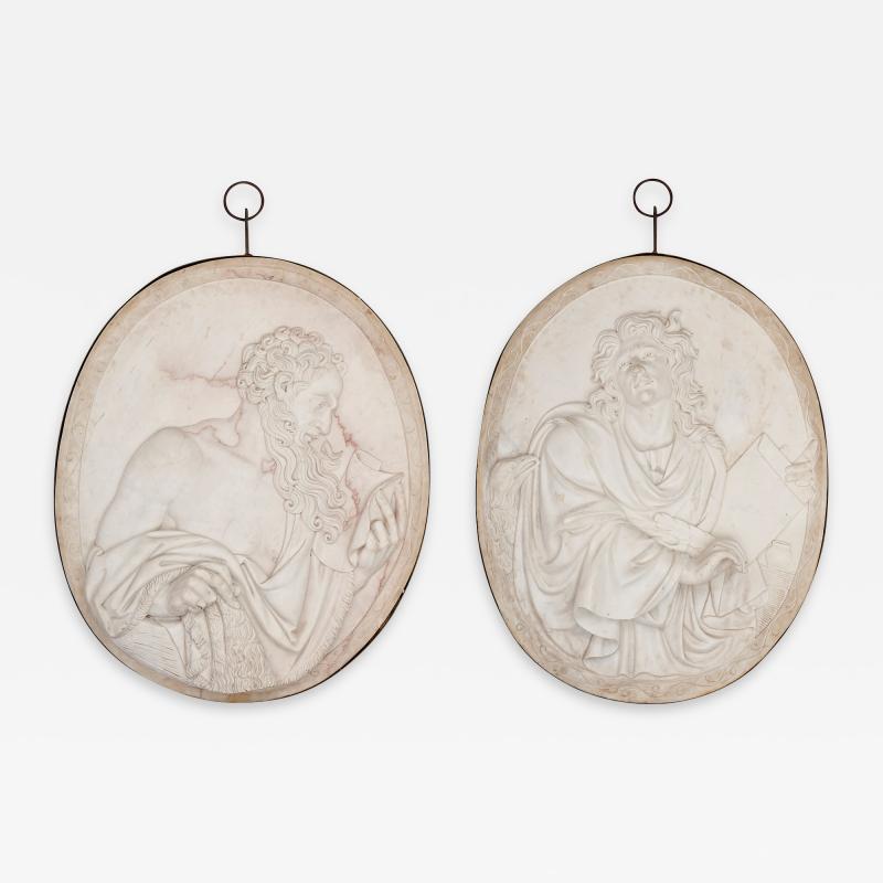 Two large sculpted marble relief plaques of St John and St James