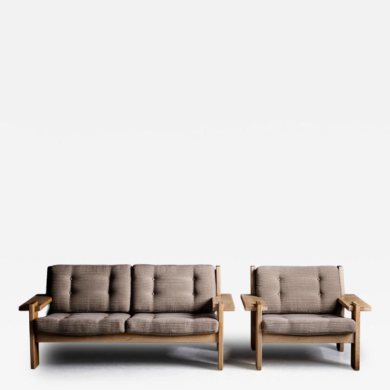 Two seater brutalist sofa with a matching lounge chair