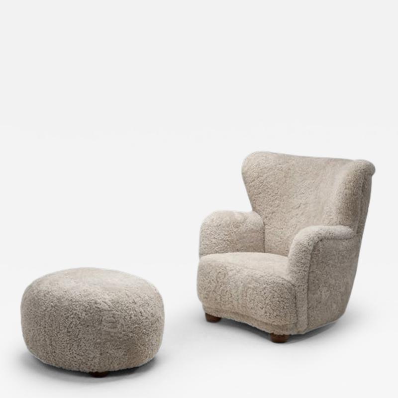 Upholstered Danish Modern Armchair with Footstool Denmark ca 1950s