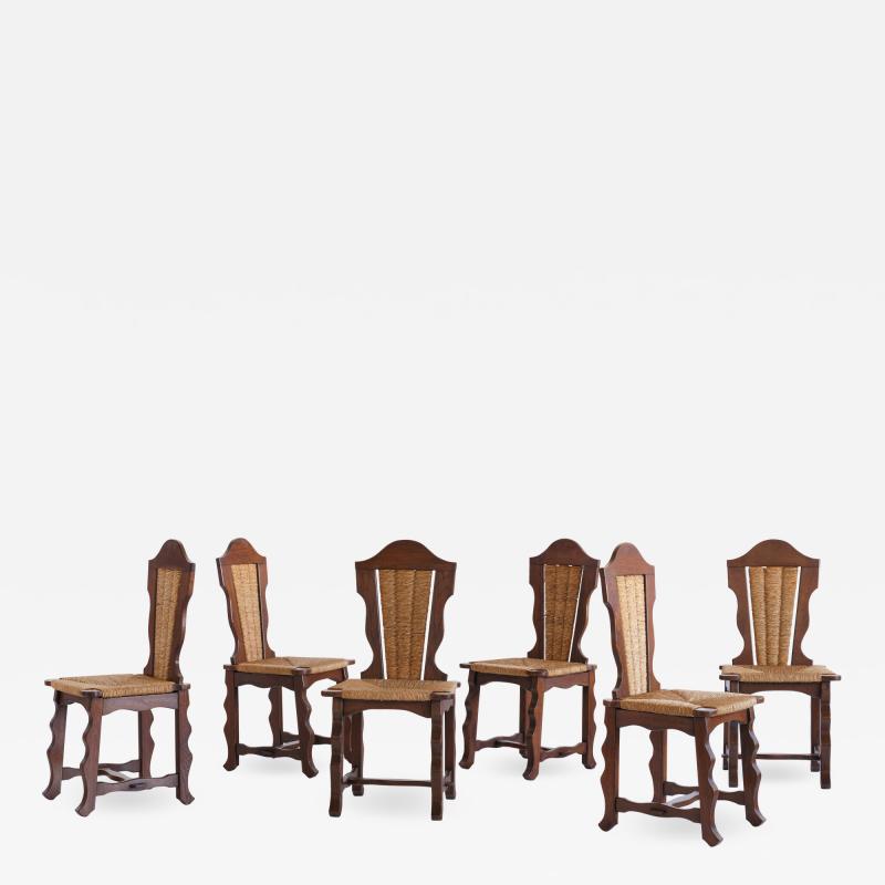 Victor Courtray Set of Six Victor Courtray Attributed Dining Chairs in Oak and Rush 1950s