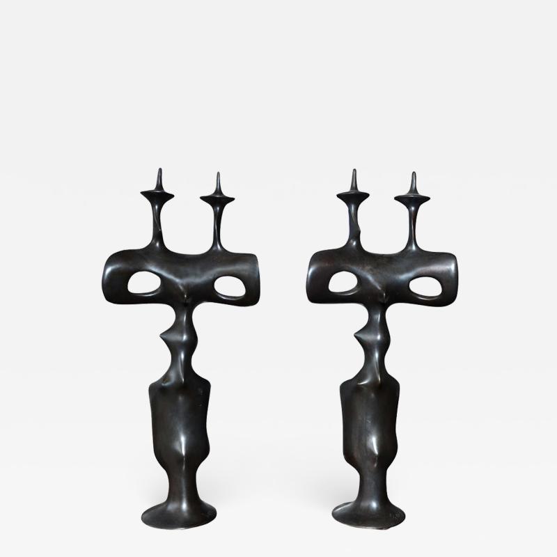 Victor Roman Pair of candelsticks in patinated bronze by Victor Roman