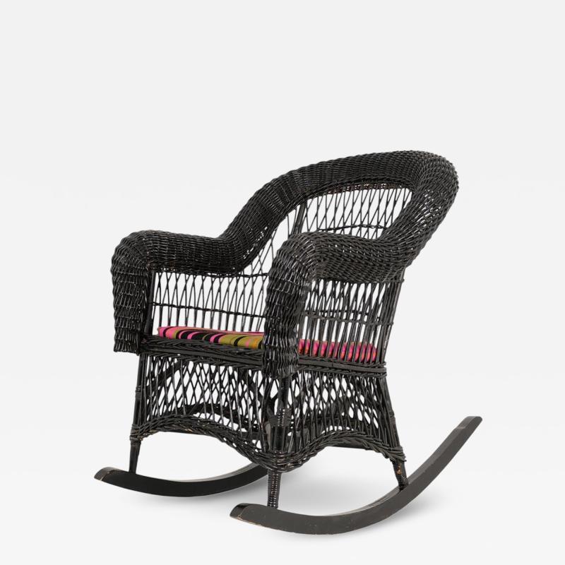 Vintage Black Wicker Rocking Chair with Colourful Cushion