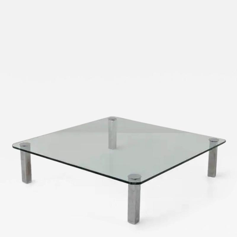 Vintage Italian glass coffee table with metal feet