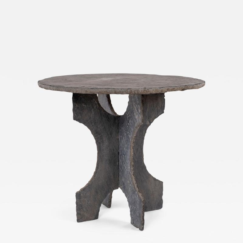 Vintage Round Slate Table from France raised upon two piece shaped slate base 