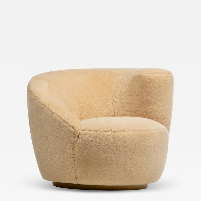 Vladimir Kagan Single Vladimir Kagan Nautilus Swivel Chair in Hand Sewn Butterscotch Shearling