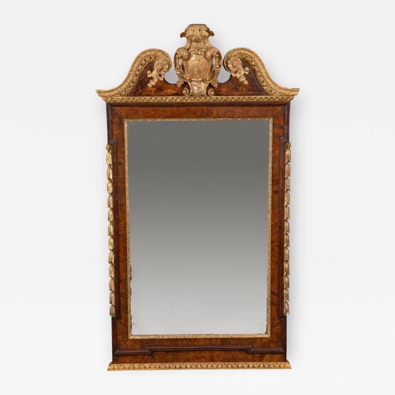 Walnut and parcel gilt mirror circa 1730