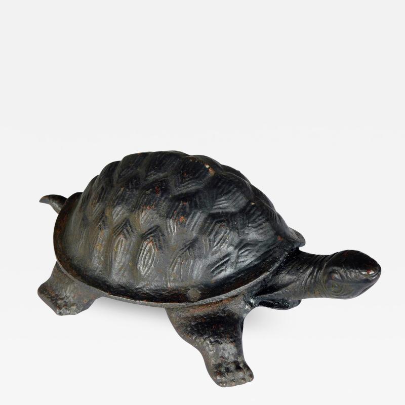 Whimsical cast iron black painted turtle form door stop garden ornament