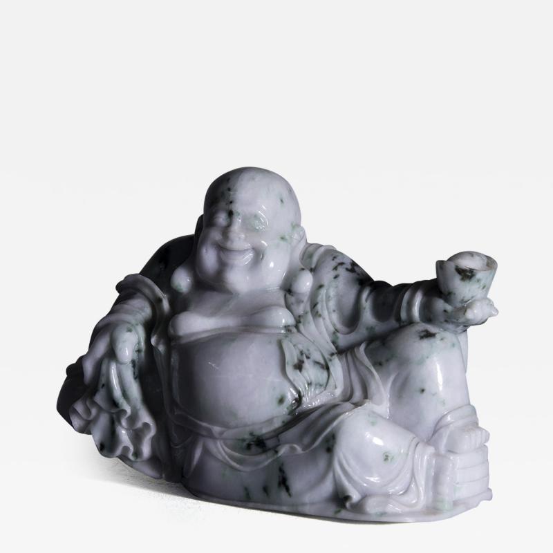 White jade Buddha statuette