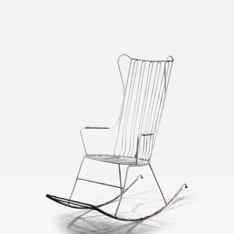 White lacquered wrought iron rocking chair