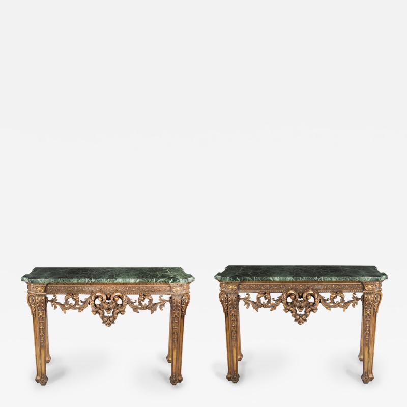 William Kent A pair of late Victorian marble and giltwood console tables