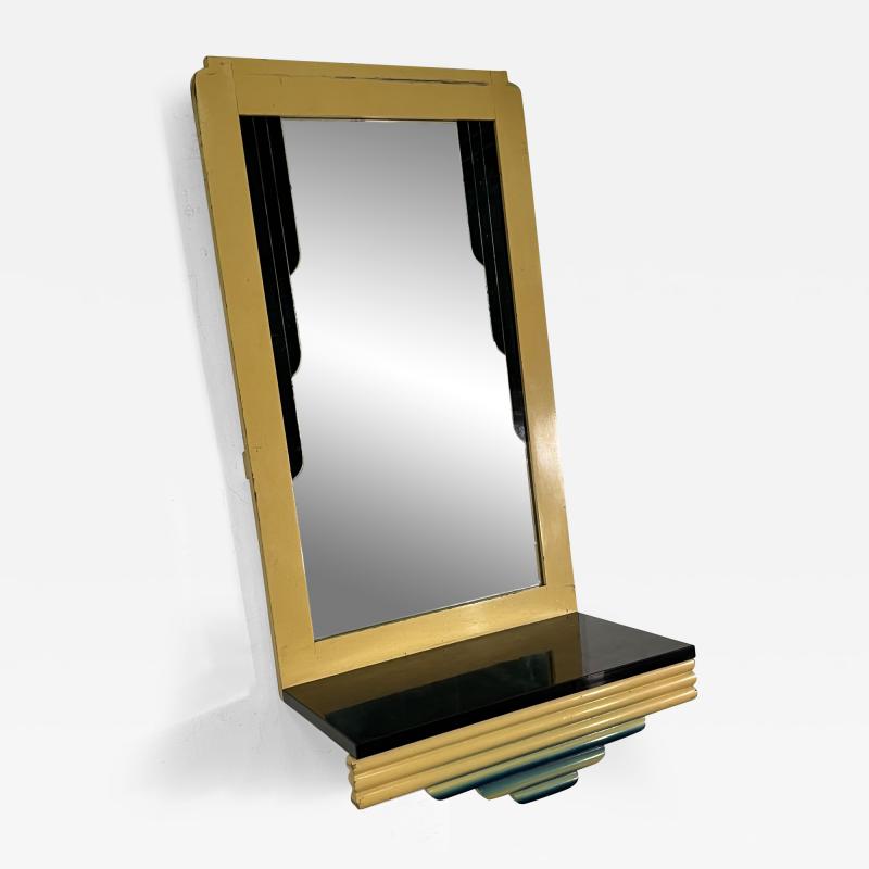 Wolfgang Hoffmann ART DECO WOOD AND REVERSE PAINTED DRAPING MIRROR WITH BAKELITE SHELF