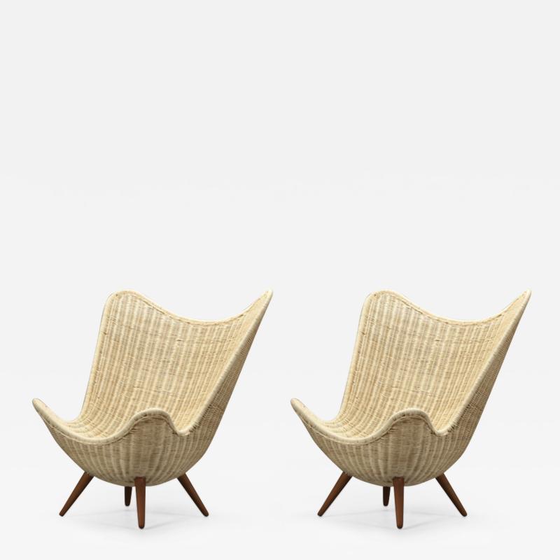 knud Vinther Knud Vinther organic pair of lounge chairs in rattan and tapered oak legs