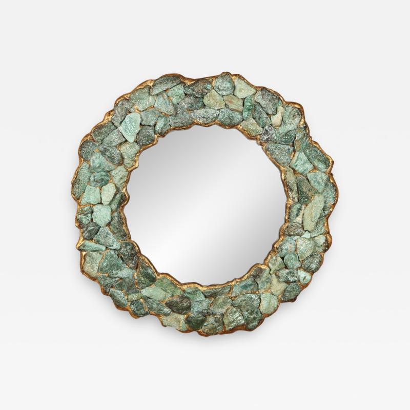 mirror in the form of a stylized flower convex Surrounded by faceted Stones