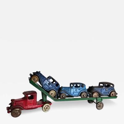  A C Williams Company Toy Cast Iron Truck Car Carrier Three Cars by A C Williams American Circa 1930