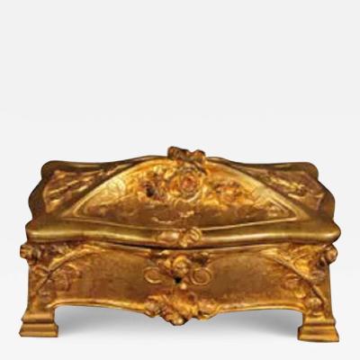  A MARIONETT AN EARLY 20TH CENTURY FRENCH GILT BRONZE JEWELRY BOX