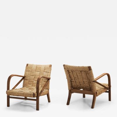  Adrien Audoux Frida Minet A Pair of Woven Rope Armchairs by Audoux Minet France ca 1950s