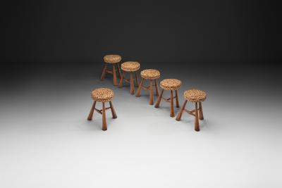  Adrien Audoux Frida Minet Six Stools with Woven Seats in the manner of Audoux Minet France 1950s