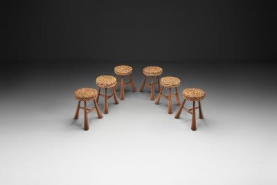  Adrien Audoux Frida Minet Six Stools with Woven Seats in the manner of Audoux Minet France 1950s