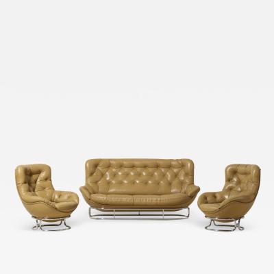  Airborne International AIRBORNE INTERNATIONAL Sopho sofa and pair of lounge chairs