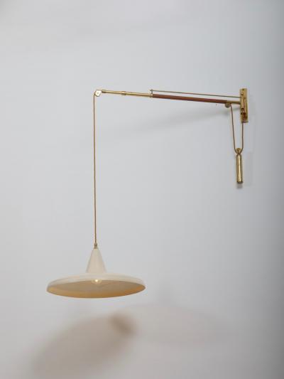  Arredoluce Swing arm wall light Brass and leather Italy c1950 Brass n