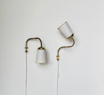  Asea Attributed to ASEA pair of adjustable wall lamps 1950s