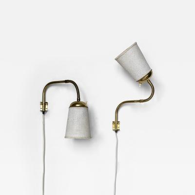  Asea Attributed to ASEA pair of adjustable wall lamps 1950s
