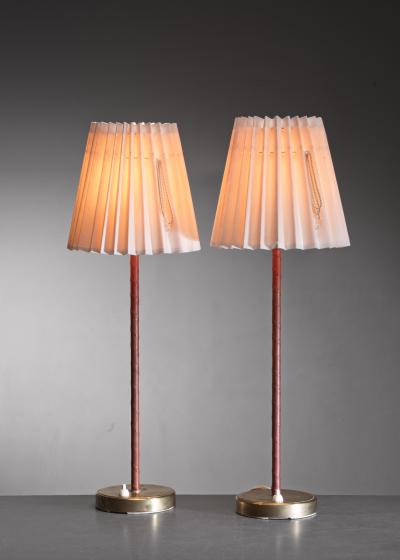  Asea Pair of ASEA brass and leather table lamps