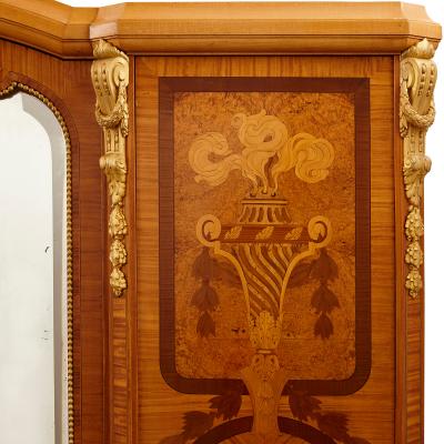  Au Gros Ch ne Large Parisian wardrobe adorned with marquetry and gilt bronze