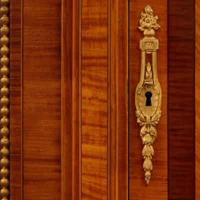  Au Gros Ch ne Large Parisian wardrobe adorned with marquetry and gilt bronze
