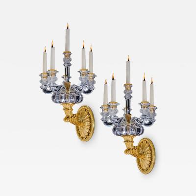  Baccarat A PAIR OF ORMOLU AND CRYSTAL EMPIRE WALL LIGHTS ATTRIBUTED TO BACCARAT