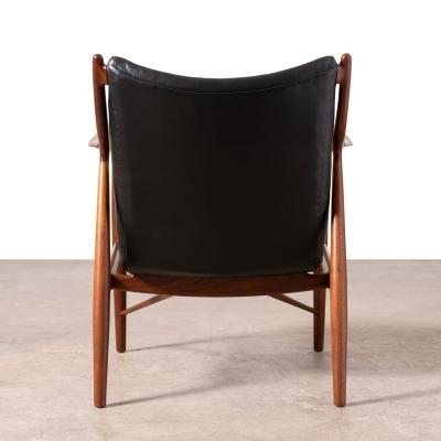  Baker Furniture Company Finn Juhl NV 45 Scandinavian Lounge Chairs in Walnut and Black Leather 1950s