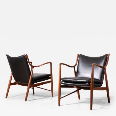  Baker Furniture Company Finn Juhl NV 45 Scandinavian Lounge Chairs in Walnut and Black Leather 1950s
