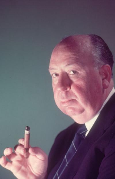  Baron Alfred Hitchcock Holding A Cigar