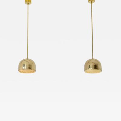  Bergboms Pair of Swedish pendant lamps in brass 