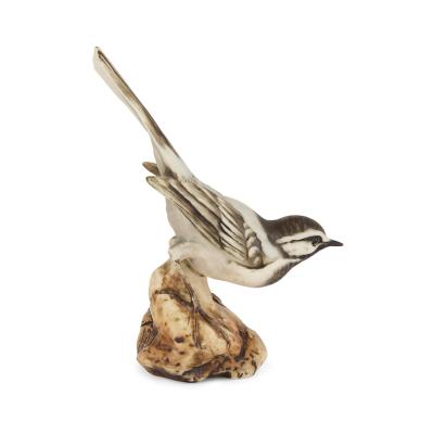  Beswick Collection of four Continental porcelain bird models