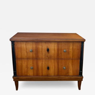  Biedermeier A Well figured Austrian Biedermeier Cherrywood Veneered Two Drawer Chest