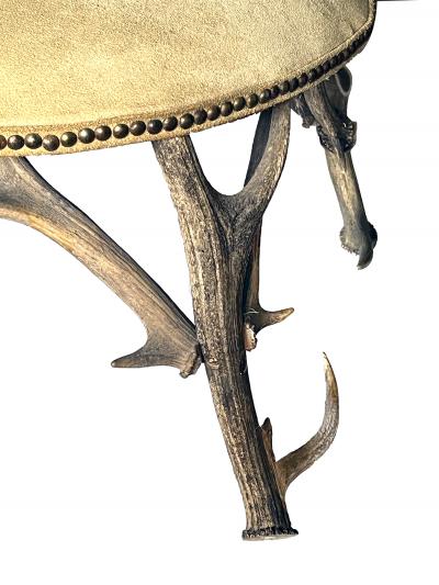  Black Forest Large Black Forest 19th Century Antler Arm Chair and Ottoman