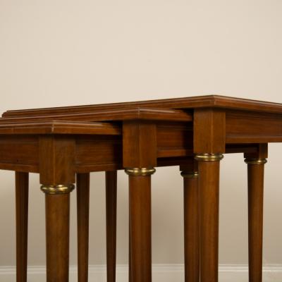  COMTE A nest of three mahogany tables attributed to Comte Circa 1940