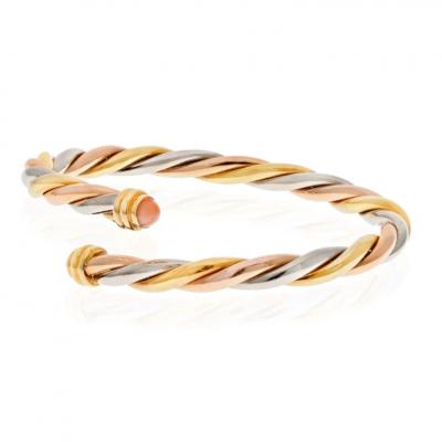  Cartier CARTIER 18K YELLOW GOLD TRI COLOR TWIST BANGLE WITH CORAL TIPS BRACELET