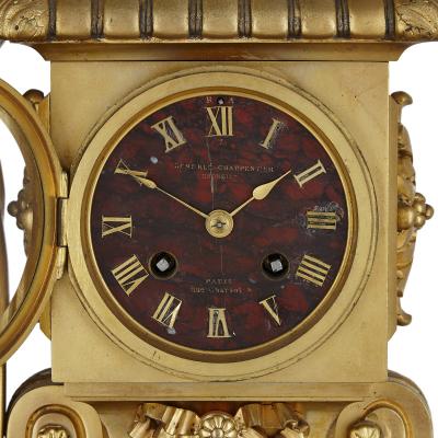  Charpentier Compagnie French red marble and gilt bronze Neoclassical style matched clock set