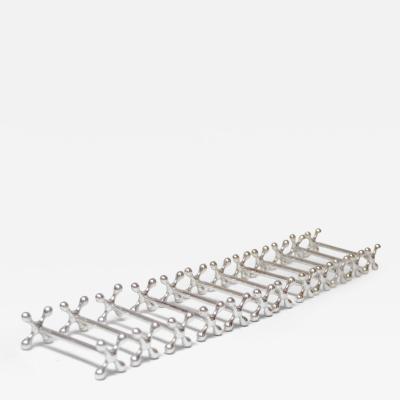  Christofle Set of Twelve Italian Art Deco Jax X Form Mitred Silver Plated Knife Rests