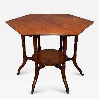  Collinson Lock Collinson Lock attributed An Aesthetic Movement walnut octagonal center table