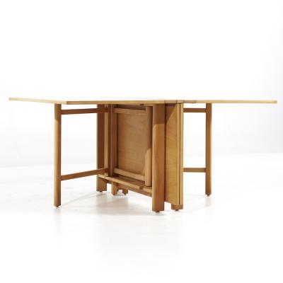  Dux Dux Mid Century Maria Swedish Elm Beech and Brass Expanding Dining Table