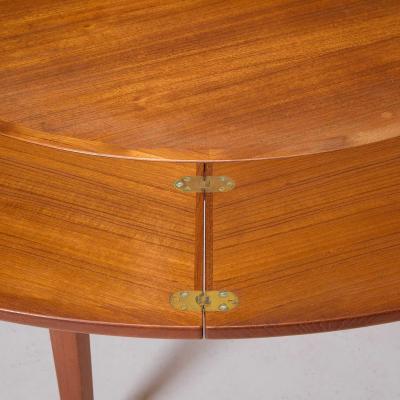  Dyrlund Danish Teak Circular Expanding Flip Flap Dining Table by Dyrlund Furniture